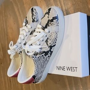 9.5 nine west  taupe multi snake  print sneaker w pink back.  worn once.